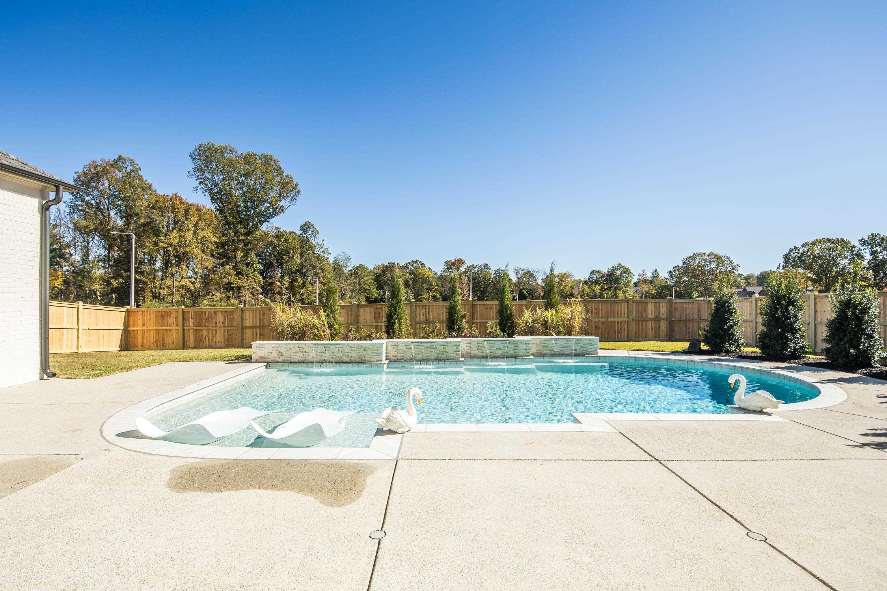 3280 Hidden Creek Loop West Collierville, TN 38017 - Photo 35 of 40 a view of a yard and a large tree