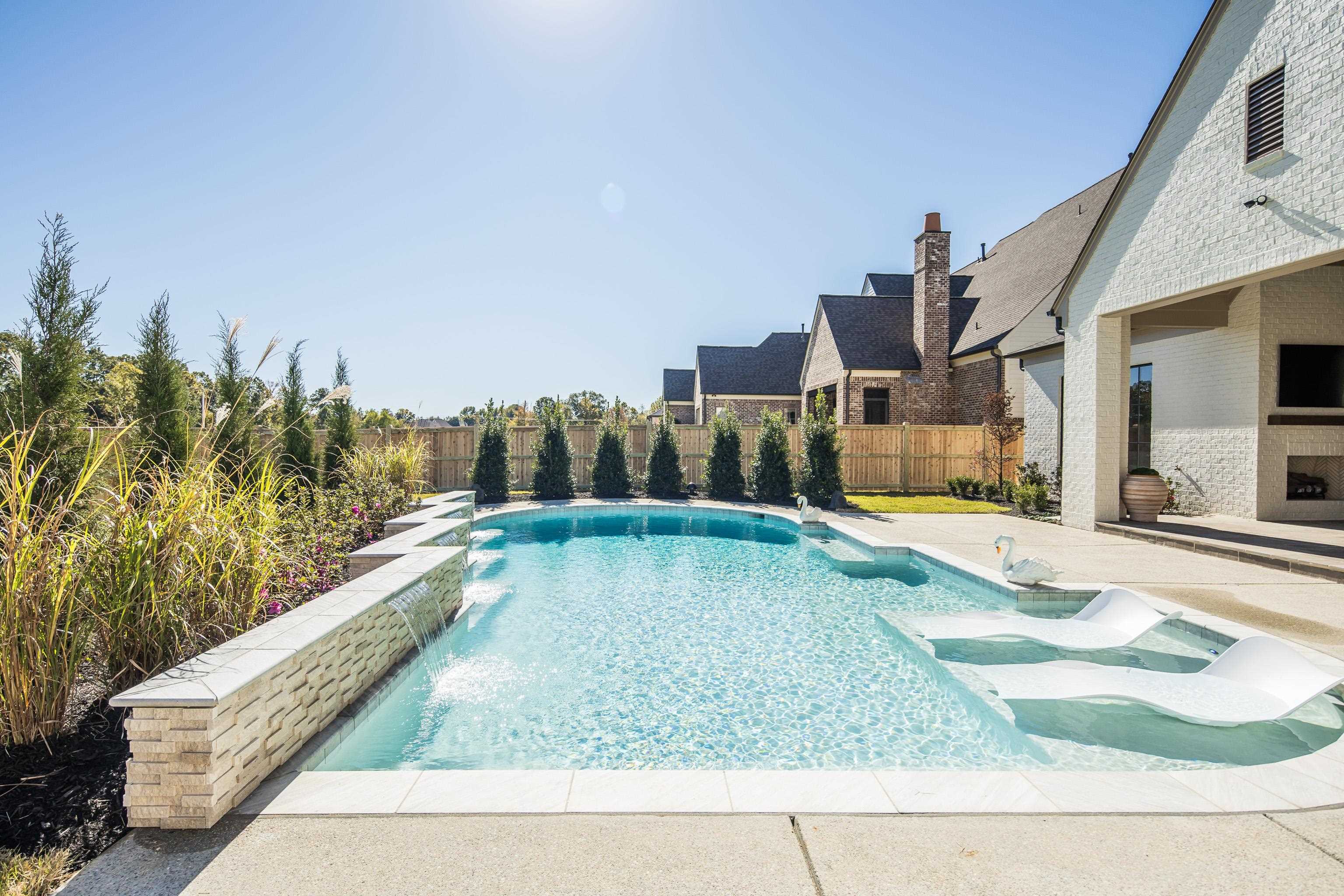 3280 Hidden Creek Loop West Collierville, TN 38017 - Photo 37 of 40 a view of a swimming pool with a terrace