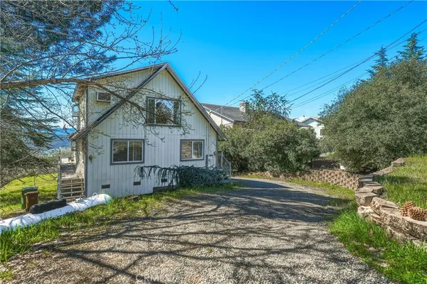 a view of balcony with wooden floor