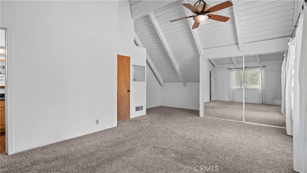 a kitchen with a stove top oven sink and cabinets