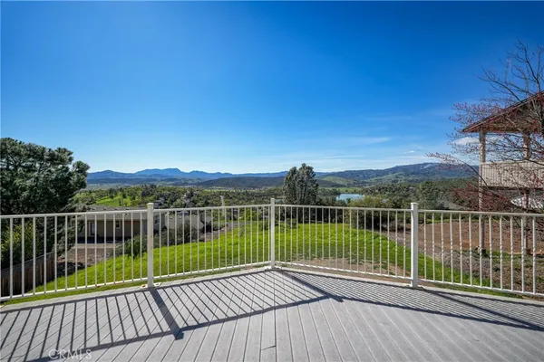 a kitchen with a stove a refrigerator and a sink