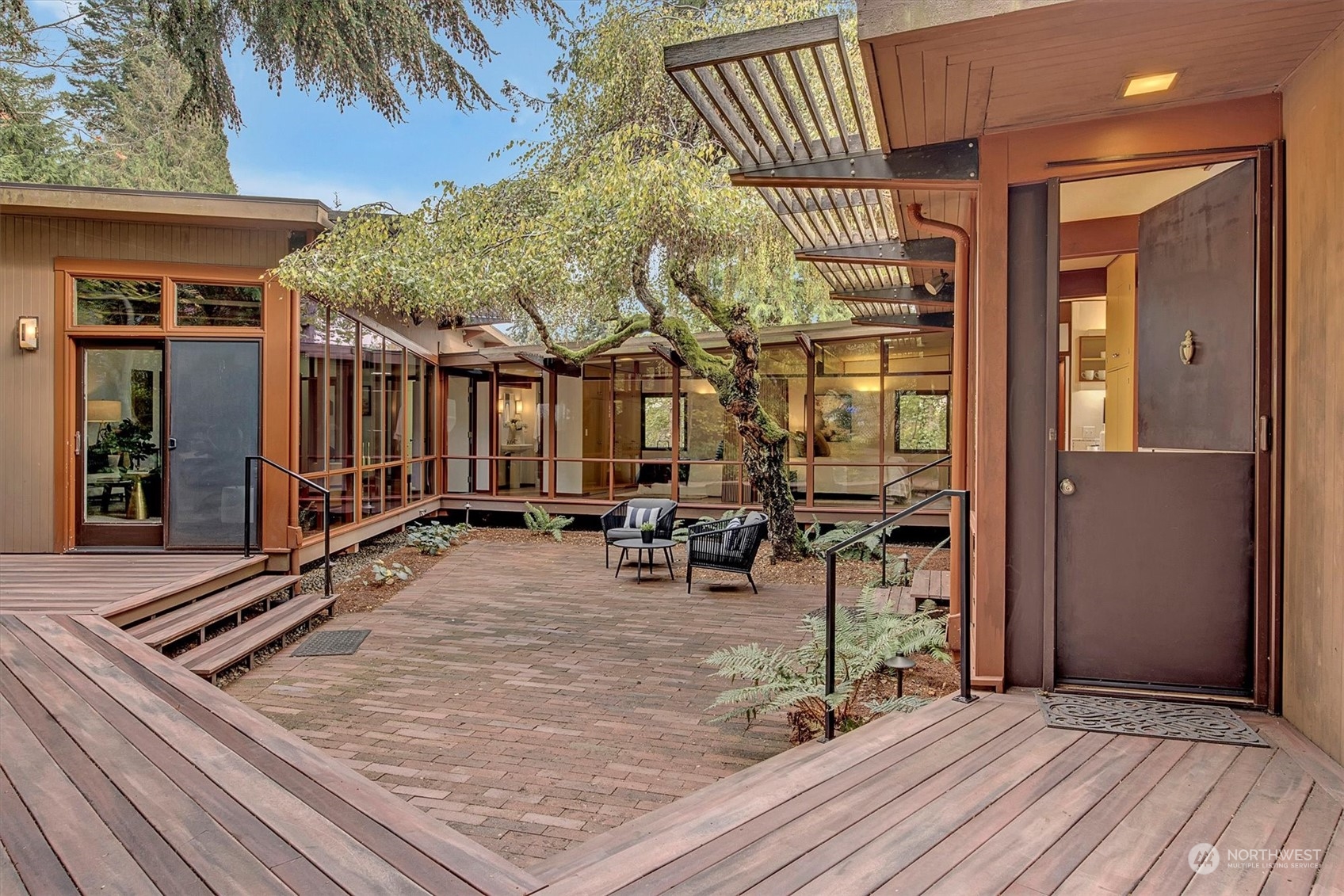 a view of a house with sitting area