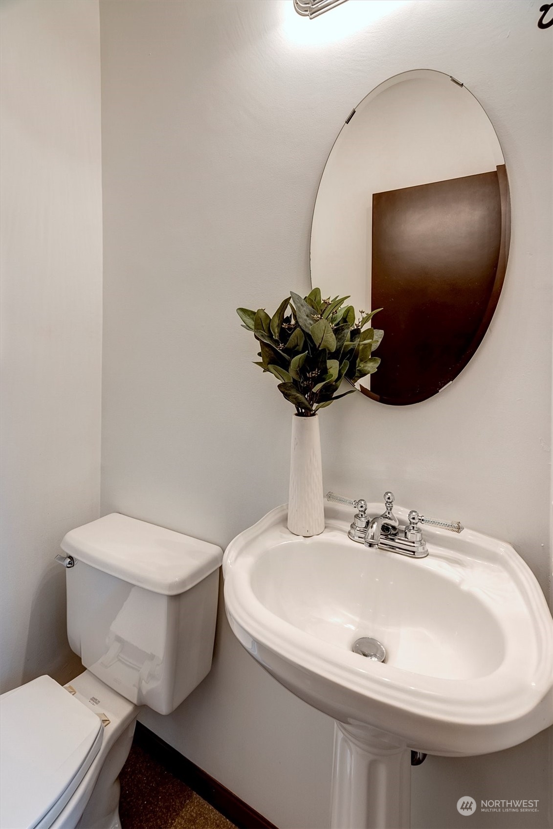 1360 Southwest 175th Street Normandy Park, WA 98166 - Photo 19 of 29 a bathroom with a sink and mirror