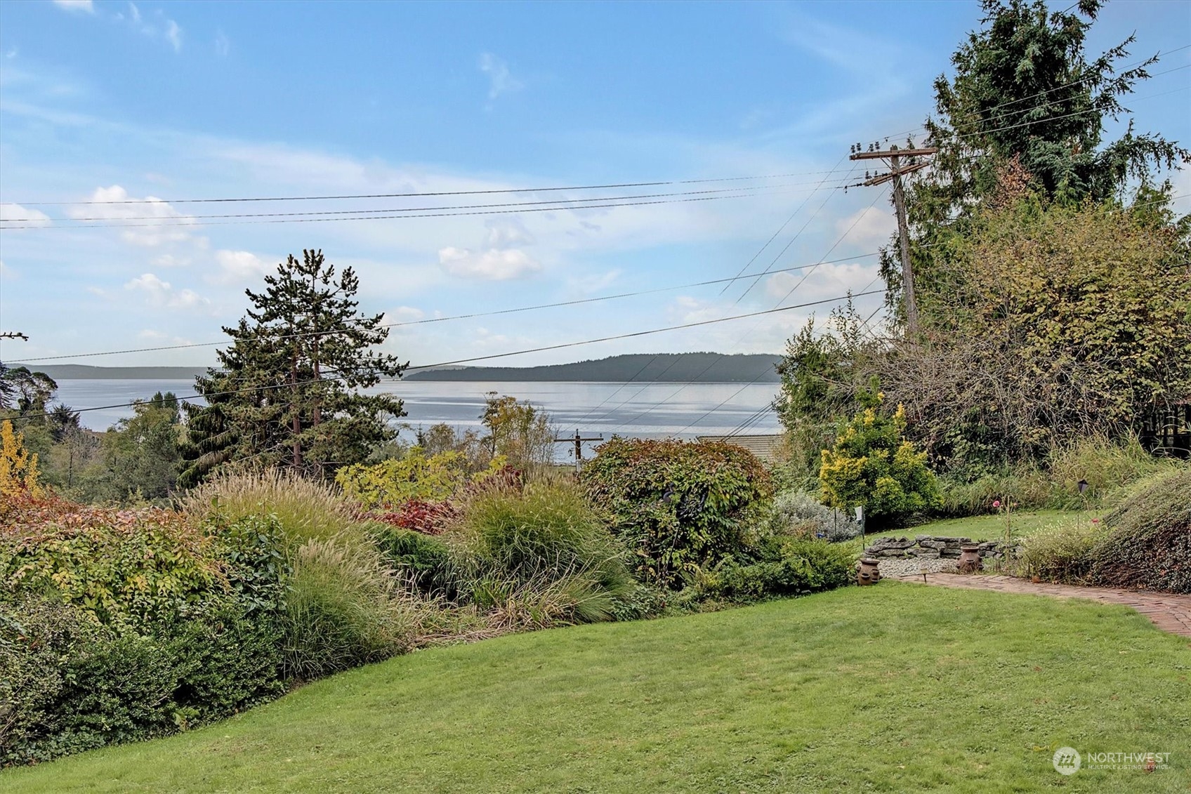 1360 Southwest 175th Street Normandy Park, WA 98166 - Photo 23 of 29 a view of a yard with an outdoor space