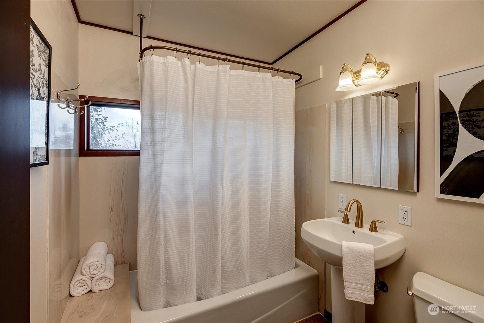 1360 Southwest 175th Street Normandy Park, WA 98166 - Photo 9 of 29 a bathroom with a sink vanity mirror and a shower