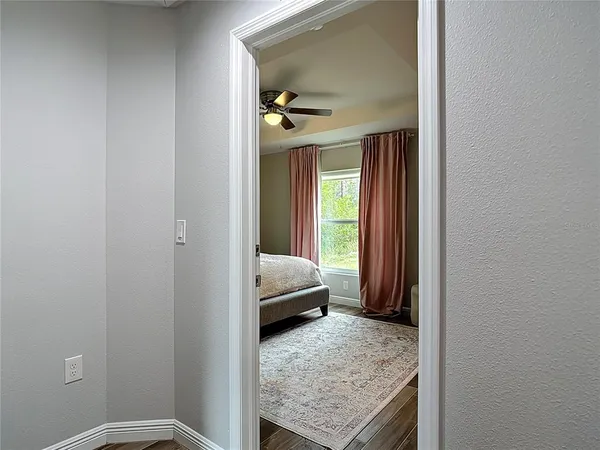 an aerial view of a house with yard swimming pool and outdoor seating