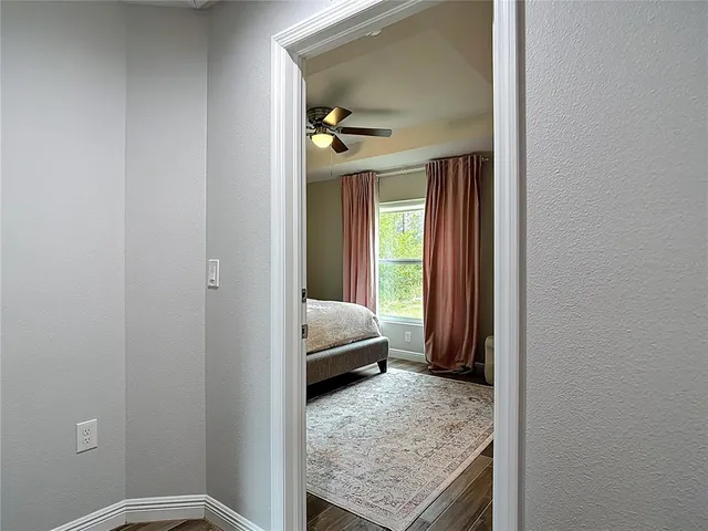 an aerial view of a house with yard swimming pool and outdoor seating