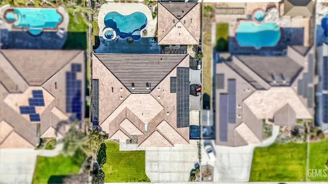 aerial view of a house with a swimming pool