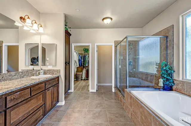 a view of house with swimming pool outdoor seating