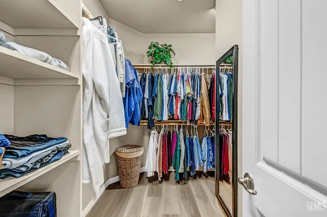 a view of a patio with couches and potted plants