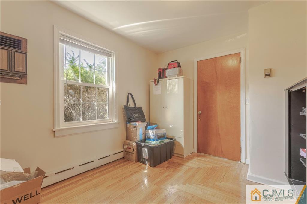 297 Washington Road Sayreville, NJ 08872 - Photo 21 of 44 a living room with furniture and a window