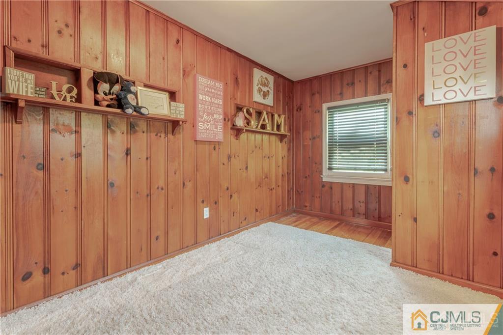 297 Washington Road Sayreville, NJ 08872 - Photo 25 of 44 a view of an empty room with a window