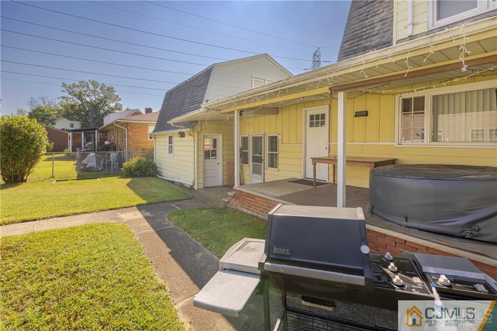 297 Washington Road Sayreville, NJ 08872 - Photo 38 of 44 a view of a house with a backyard