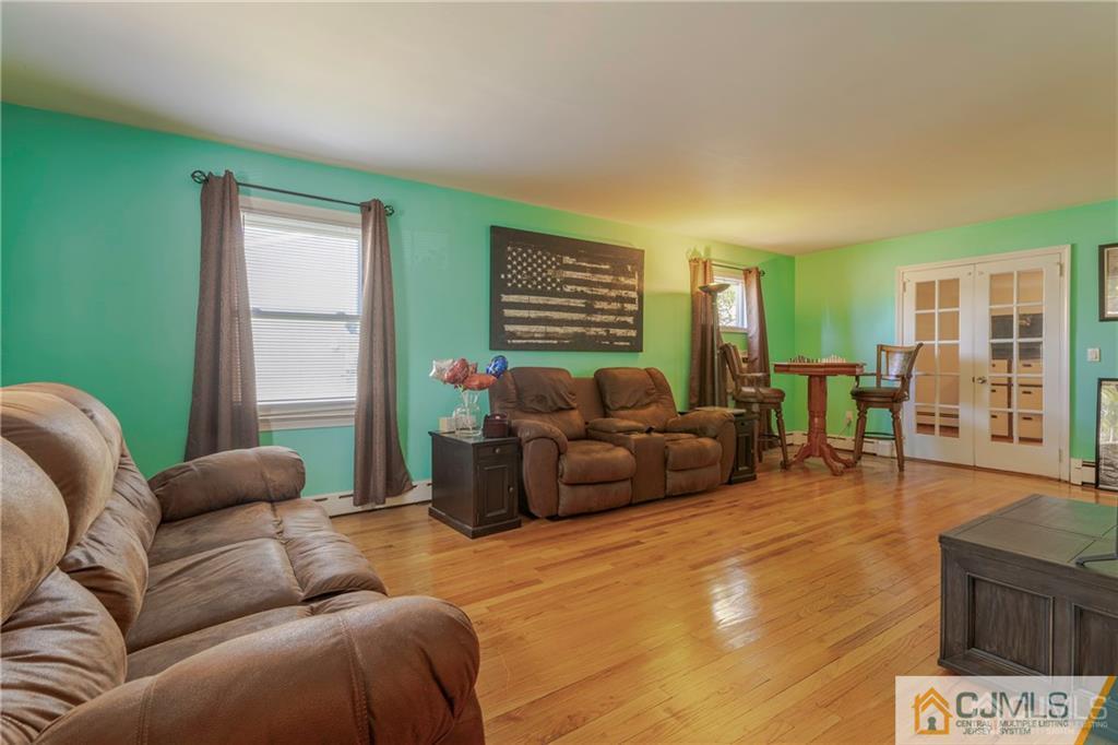 297 Washington Road Sayreville, NJ 08872 - Photo 7 of 44 a living room with furniture and a window
