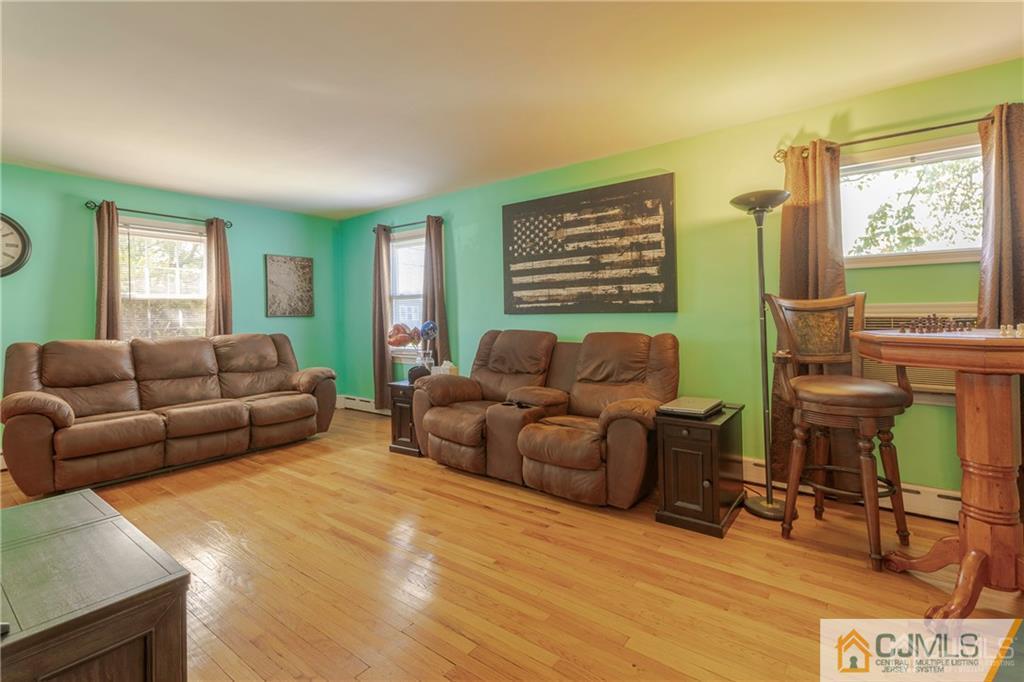 297 Washington Road Sayreville, NJ 08872 - Photo 9 of 44 a living room with furniture and a window