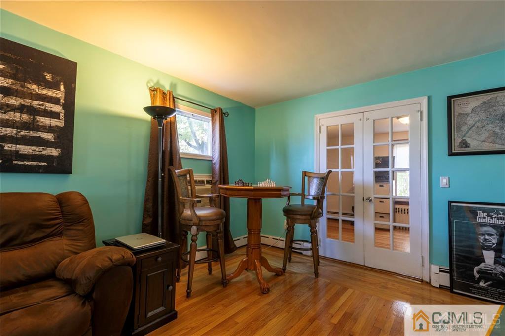 297 Washington Road Sayreville, NJ 08872 - Photo 10 of 44 a living room with furniture and a window