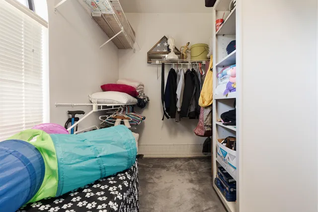 a kitchen with stainless steel appliances granite countertop a refrigerator stove and sink