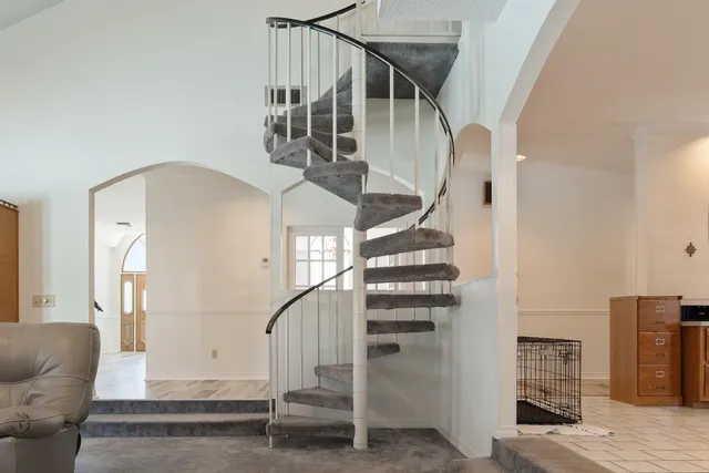 a bathroom with a shower and a toilet