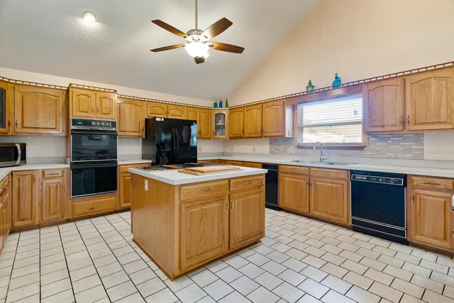 a view of a small space in front of a house