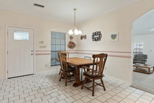 a picture of a bathroom with a shower