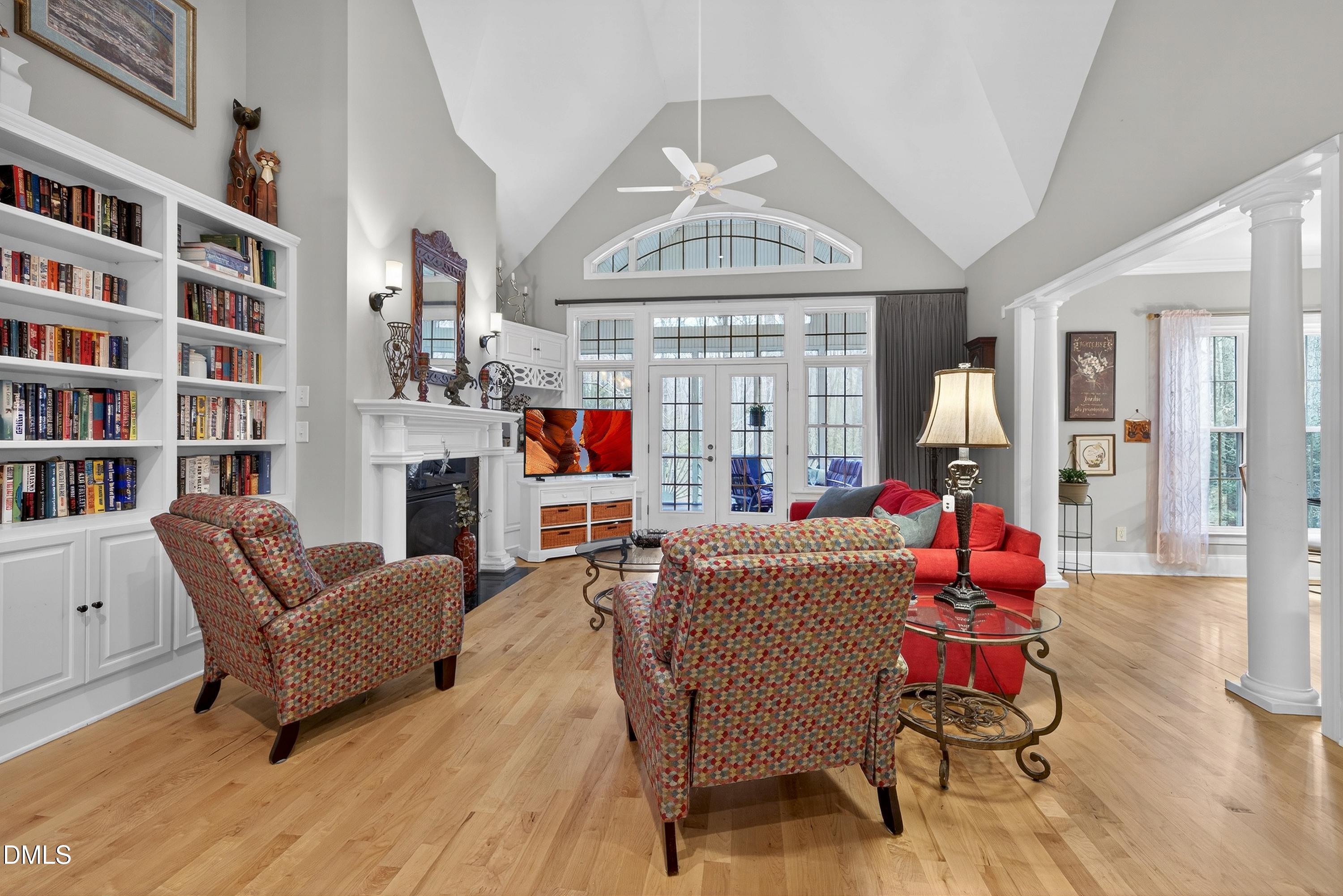 4613 Cross Brook Lane Raleigh, NC 27610 - Photo 11 of 53 a living room with furniture a rug and a chandelier