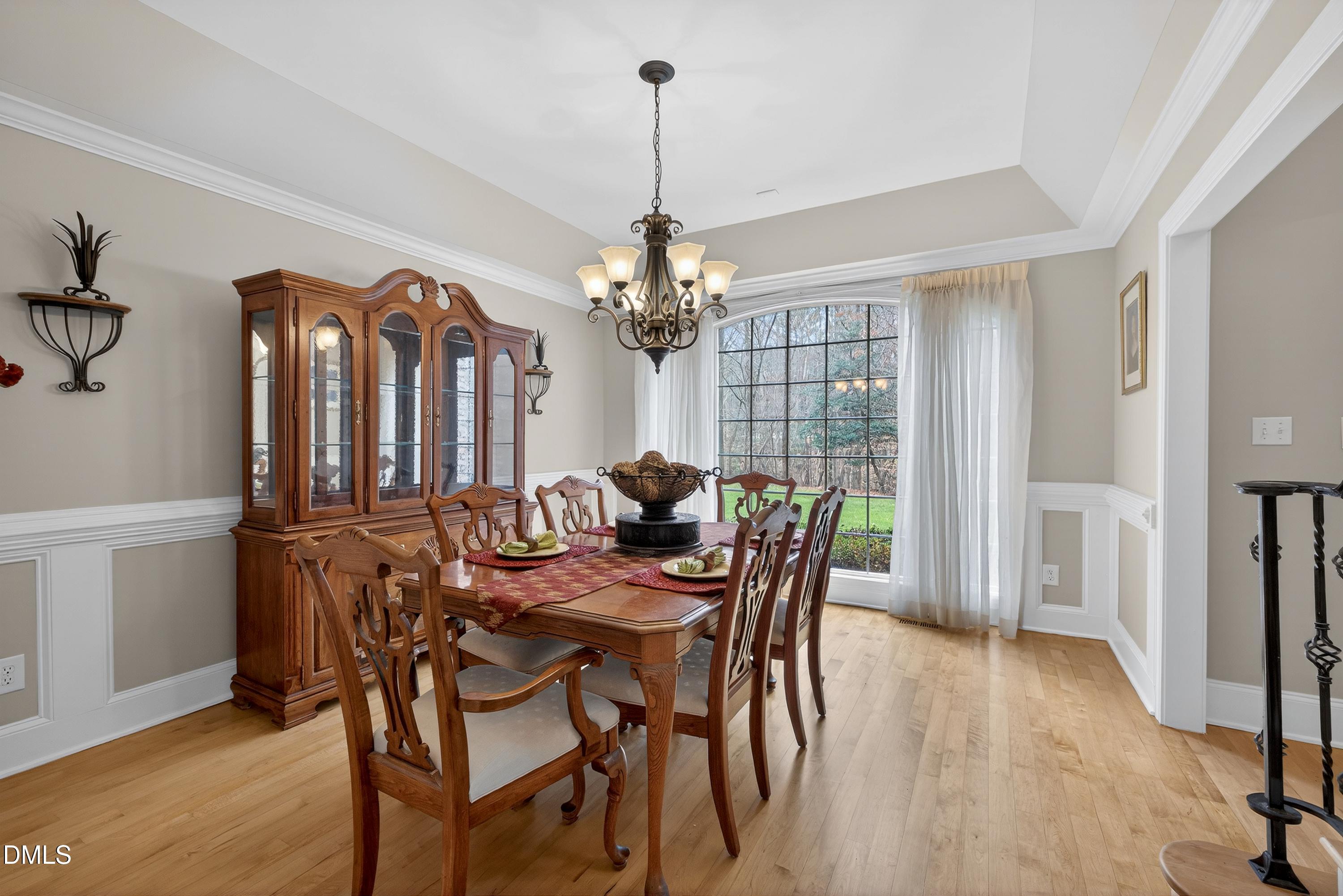 4613 Cross Brook Lane Raleigh, NC 27610 - Photo 14 of 53 a view of a dining room with furniture and window