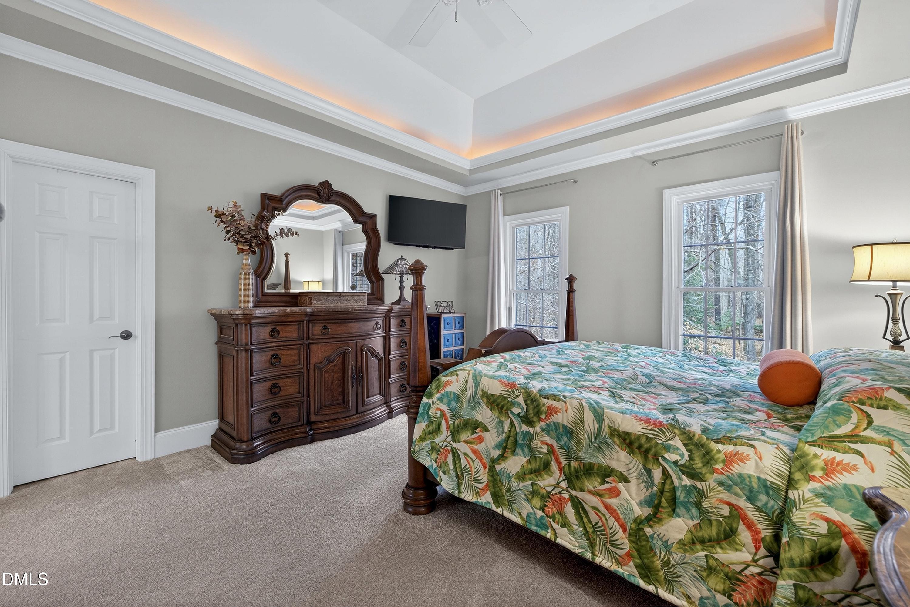 4613 Cross Brook Lane Raleigh, NC 27610 - Photo 28 of 53 a bedroom with a bed and furniture