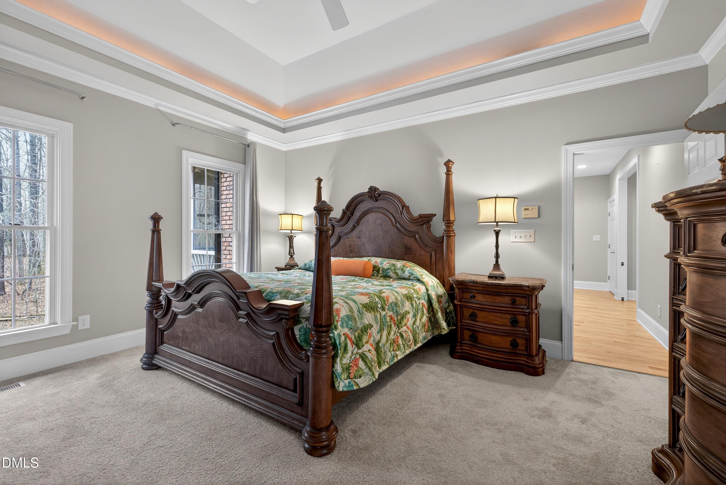 4613 Cross Brook Lane Raleigh, NC 27610 - Photo 29 of 53 a bedroom with a bed and a night stand