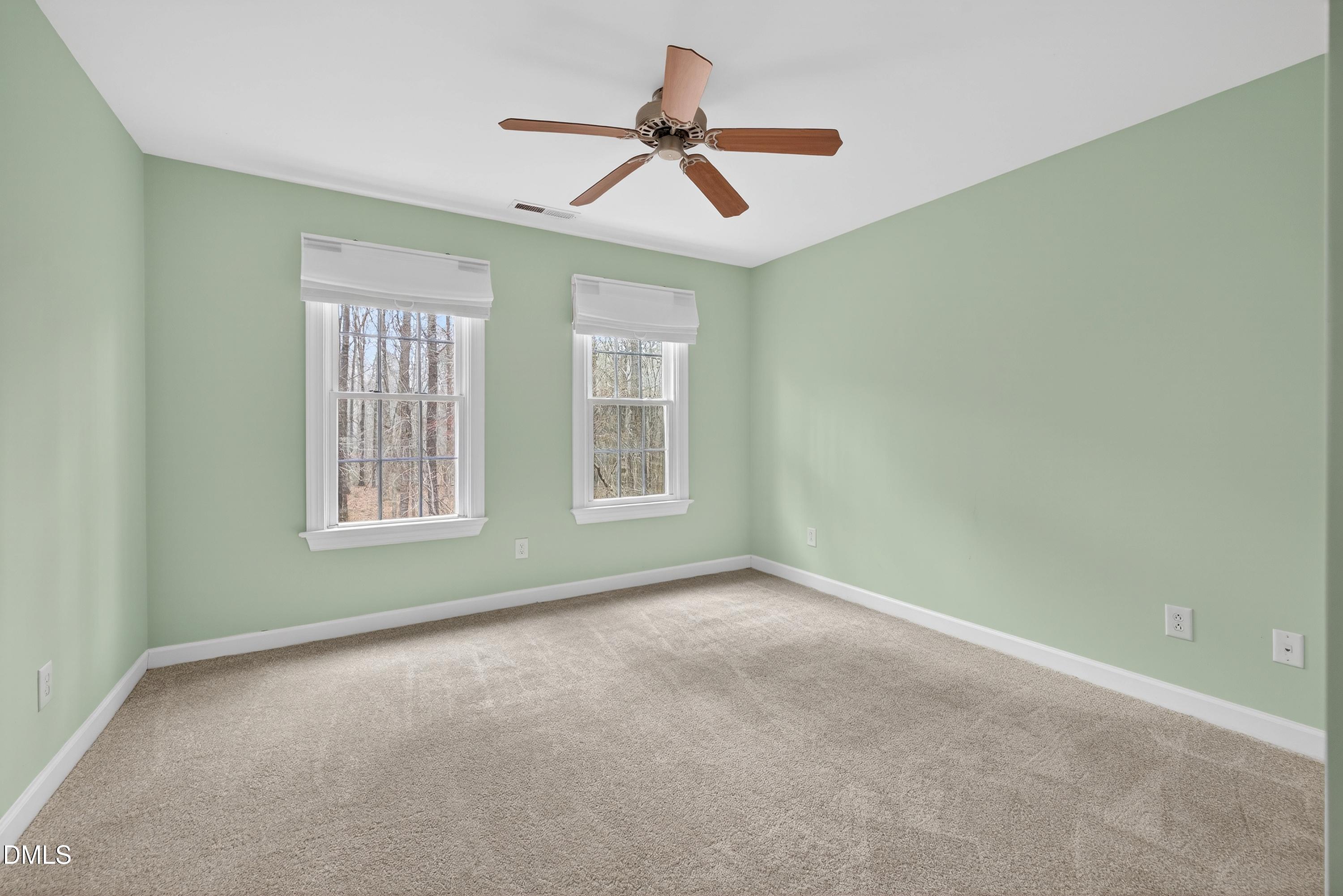 4613 Cross Brook Lane Raleigh, NC 27610 - Photo 32 of 53 a view of room with window and ceiling fan