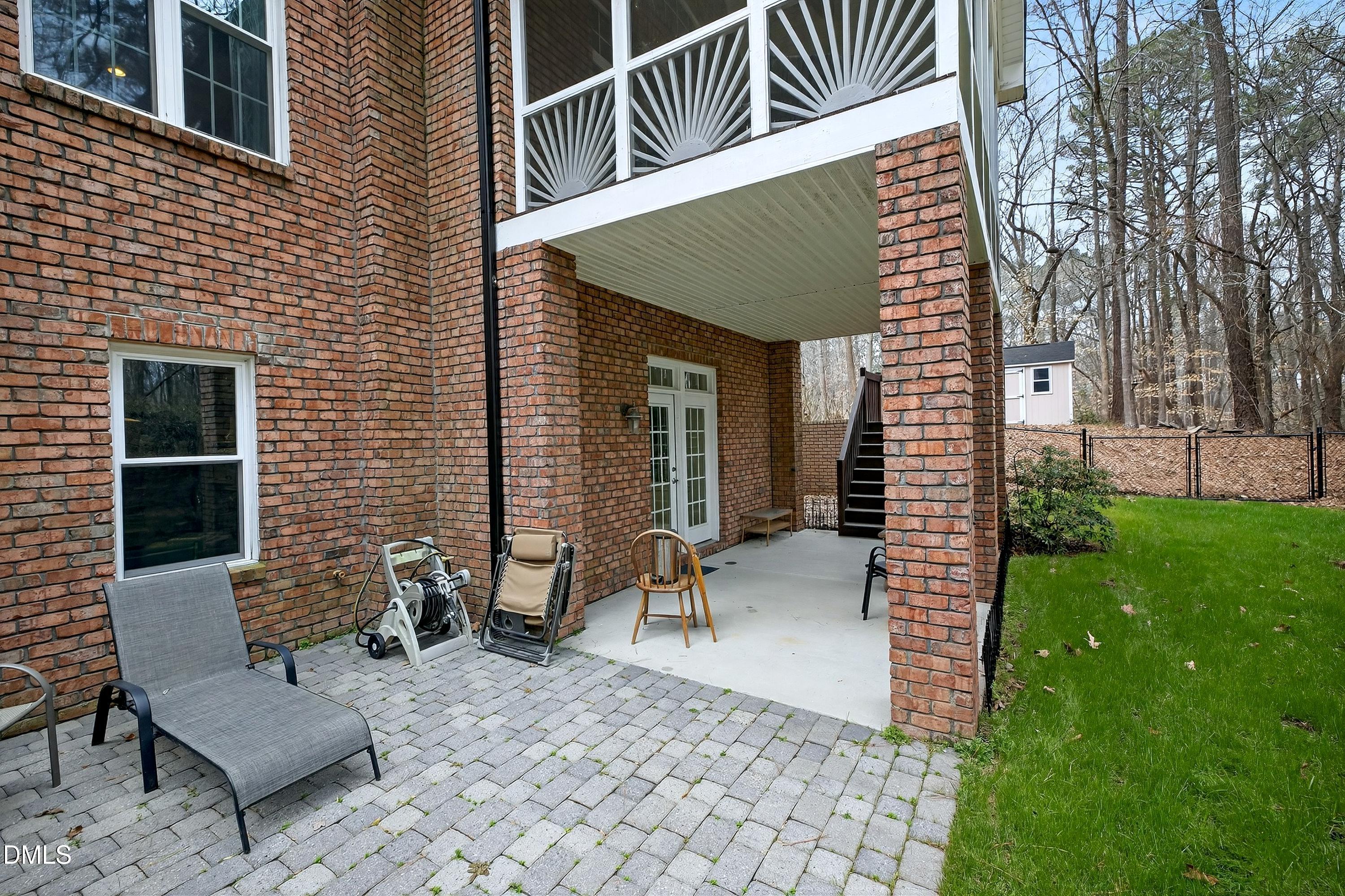 4613 Cross Brook Lane Raleigh, NC 27610 - Photo 44 of 53 a view of a patio with a chairs and table in a patio