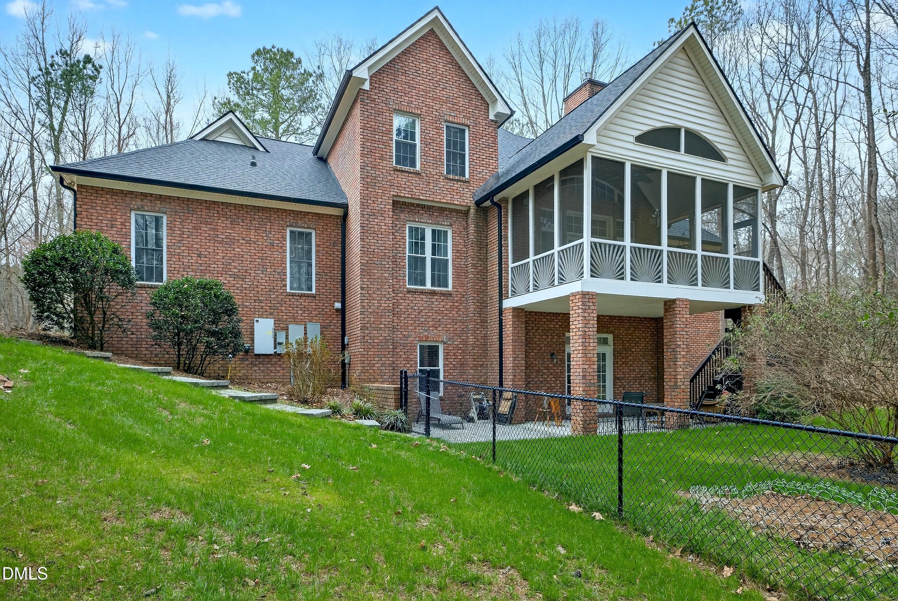 4613 Cross Brook Lane Raleigh, NC 27610 - Photo 47 of 53 a front view of a house with a yard and green space