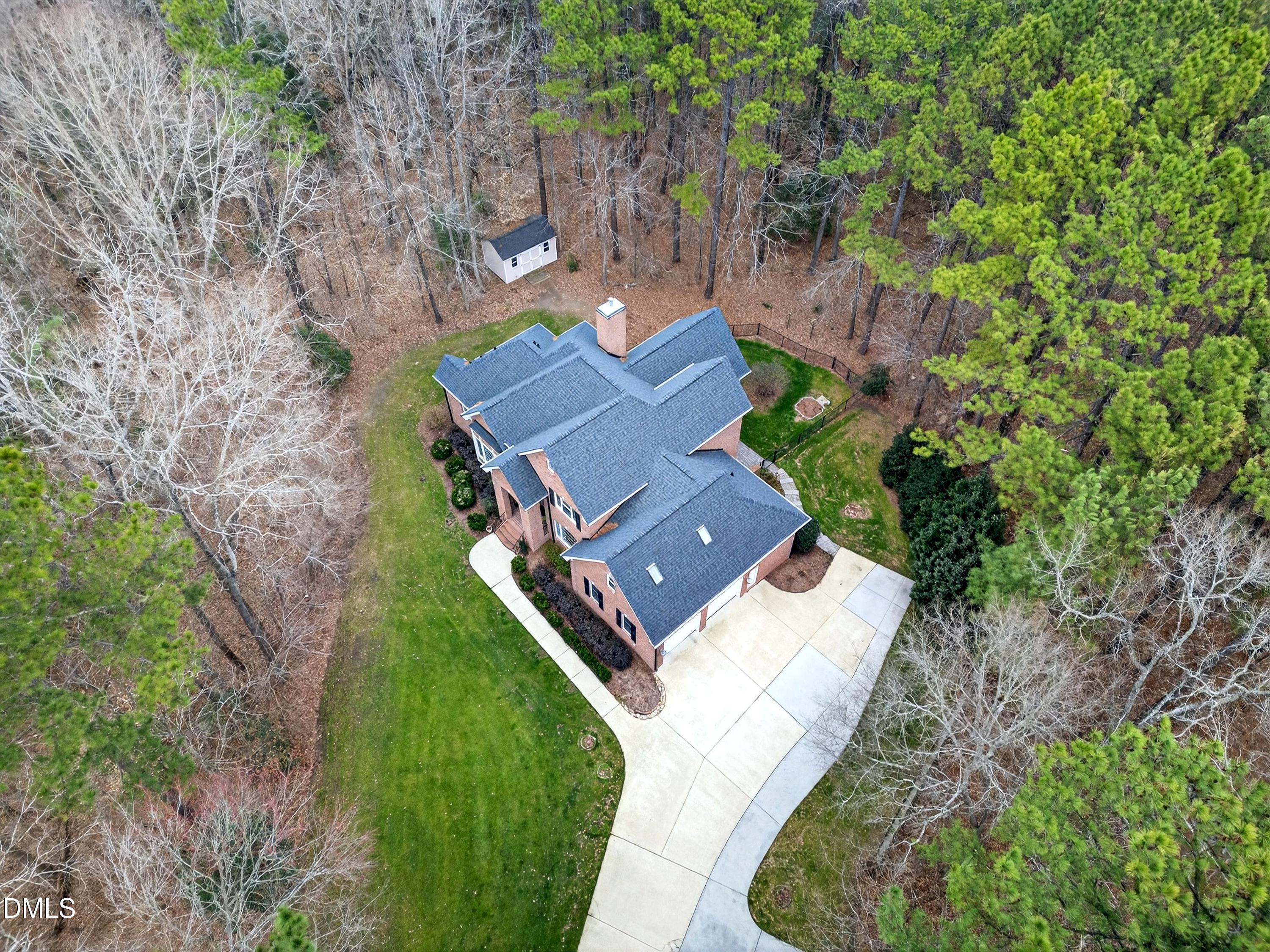 4613 Cross Brook Lane Raleigh, NC 27610 - Photo 48 of 53 an aerial view of a house with a garden