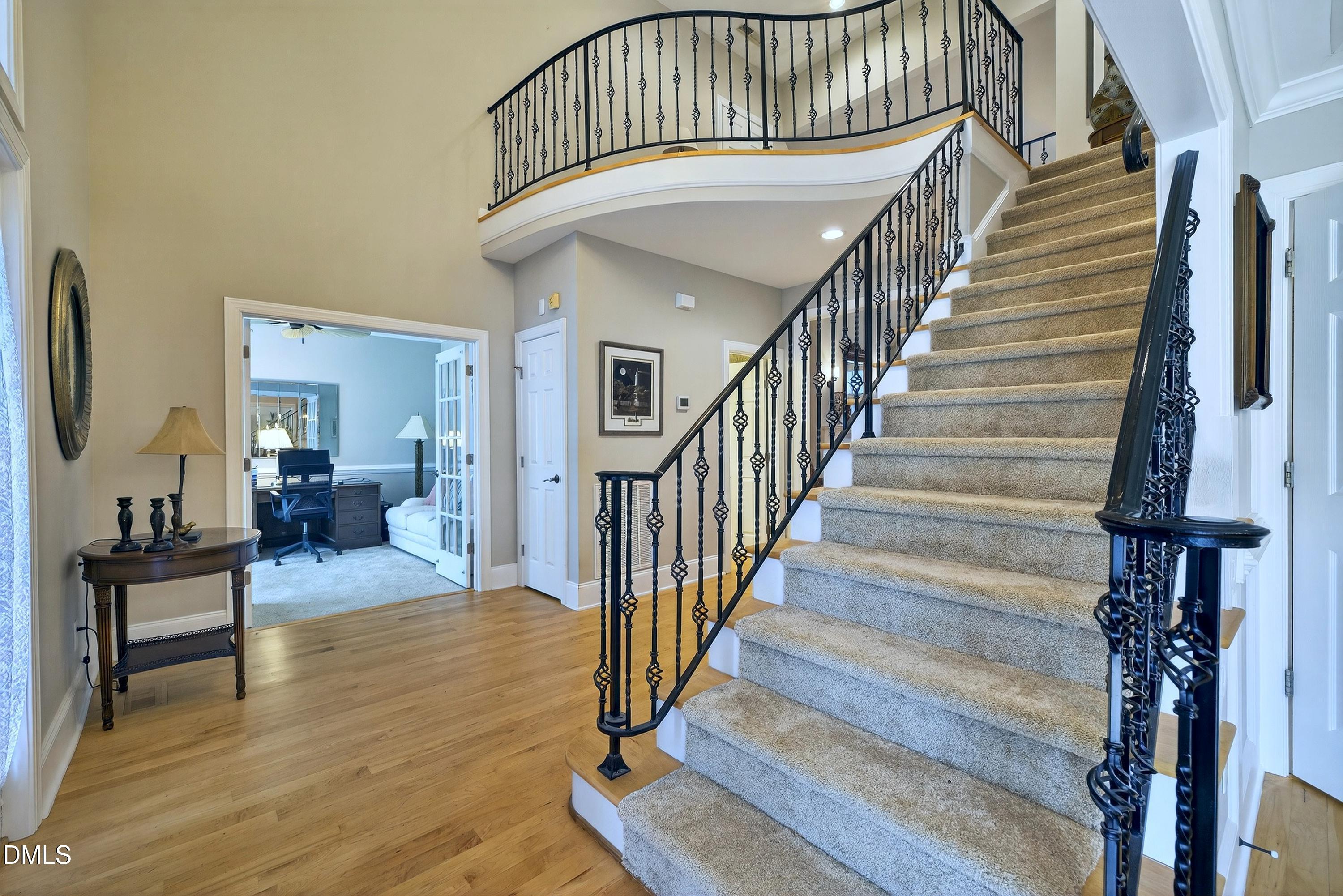 4613 Cross Brook Lane Raleigh, NC 27610 - Photo 5 of 53 a view of entryway and hall with wooden floor