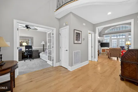 a view of a livingroom with furniture and a flat screen tv