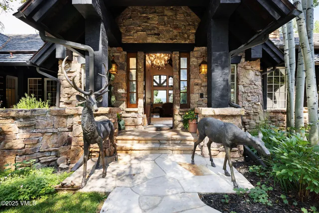 a building outdoor space with glass windows and couches