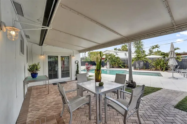 a view of an outdoor space with furniture