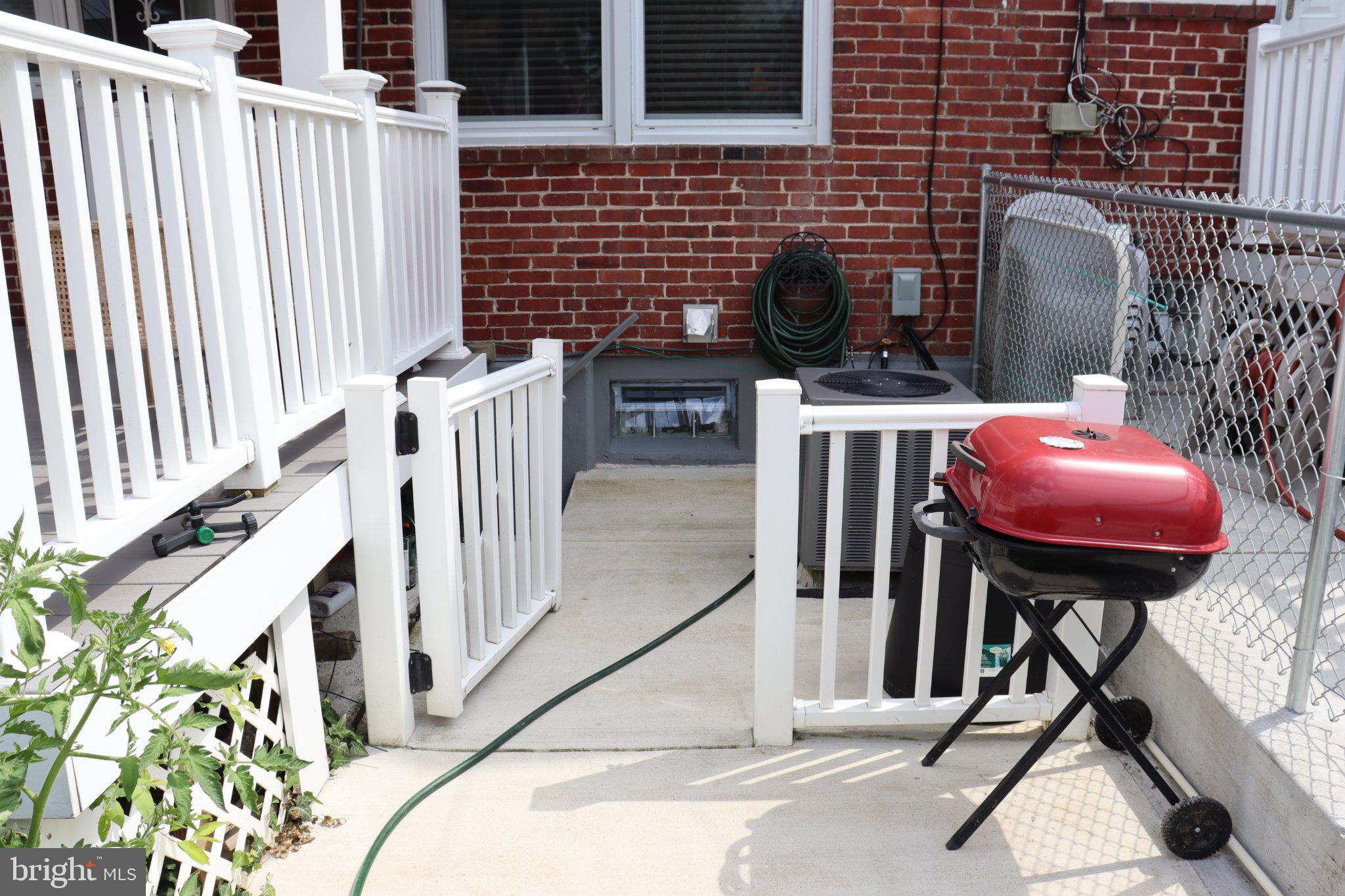 1328 Cedarcroft Road Baltimore, MD 21239 - Photo 14 of 39 Charming backyard retreat with grill.