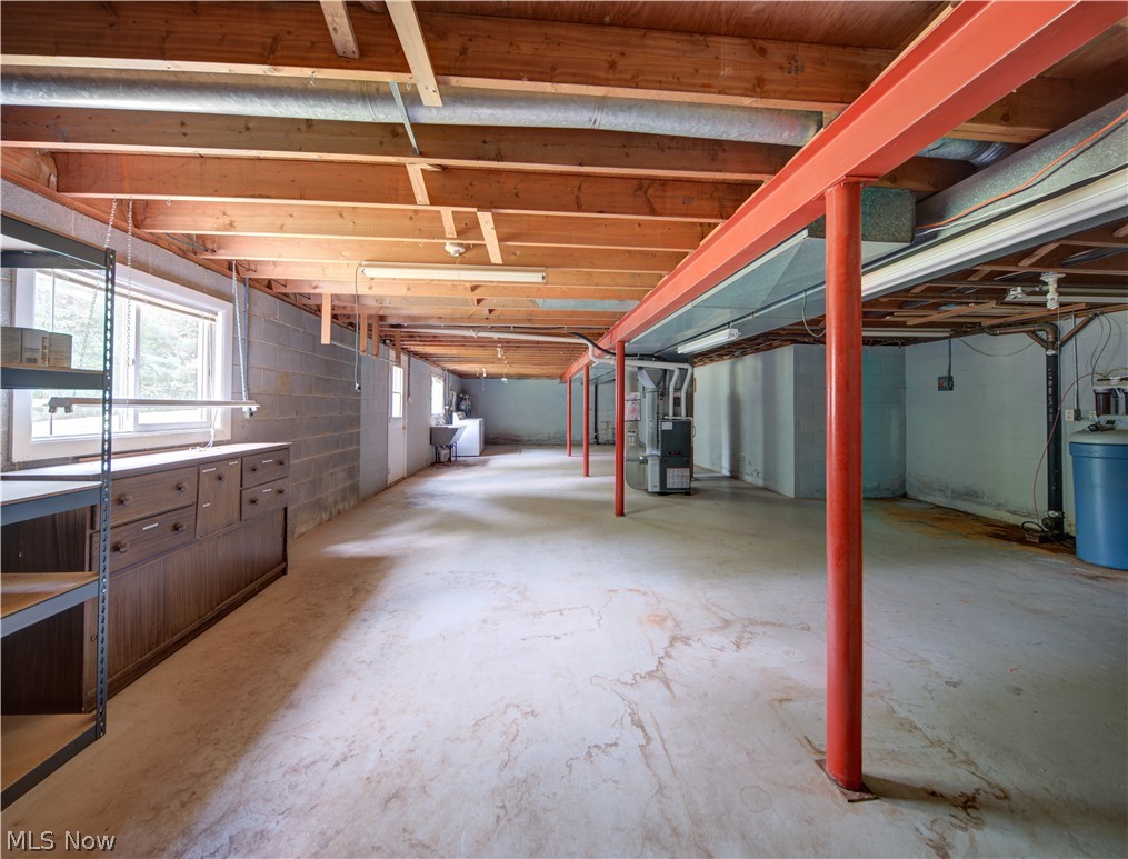11430 Ferry Road Chesterland, OH 44026 - Photo 28 of 38 Basement with heating utilities and sink