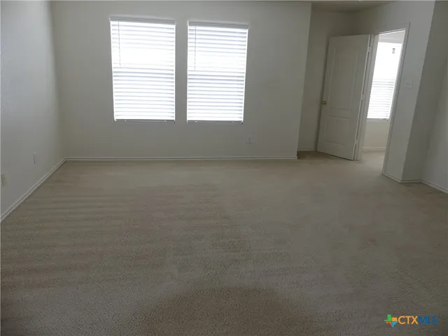 an empty room with a window