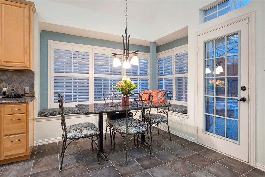 125 Bricknell Lane Coppell, TX 75019 - Photo 16 of 27 a view of a dining room with furniture window and outside view