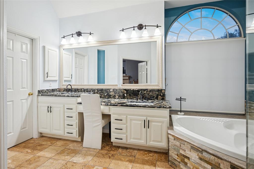 125 Bricknell Lane Coppell, TX 75019 - Photo 21 of 27 a bathroom with a sink double vanity