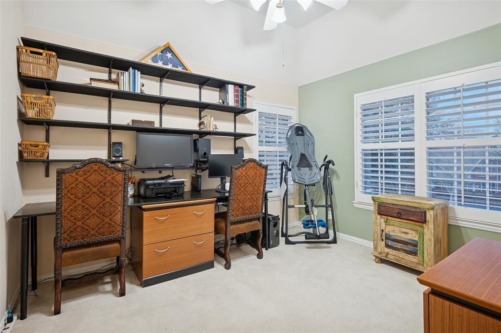 125 Bricknell Lane Coppell, TX 75019 - Photo 24 of 27 a view of a workspace with furniture and a window