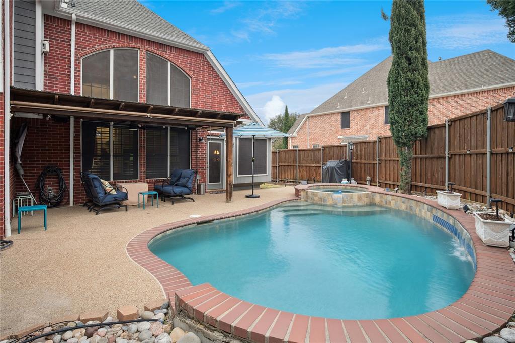 125 Bricknell Lane Coppell, TX 75019 - Photo 26 of 27 a view of a house with swimming pool