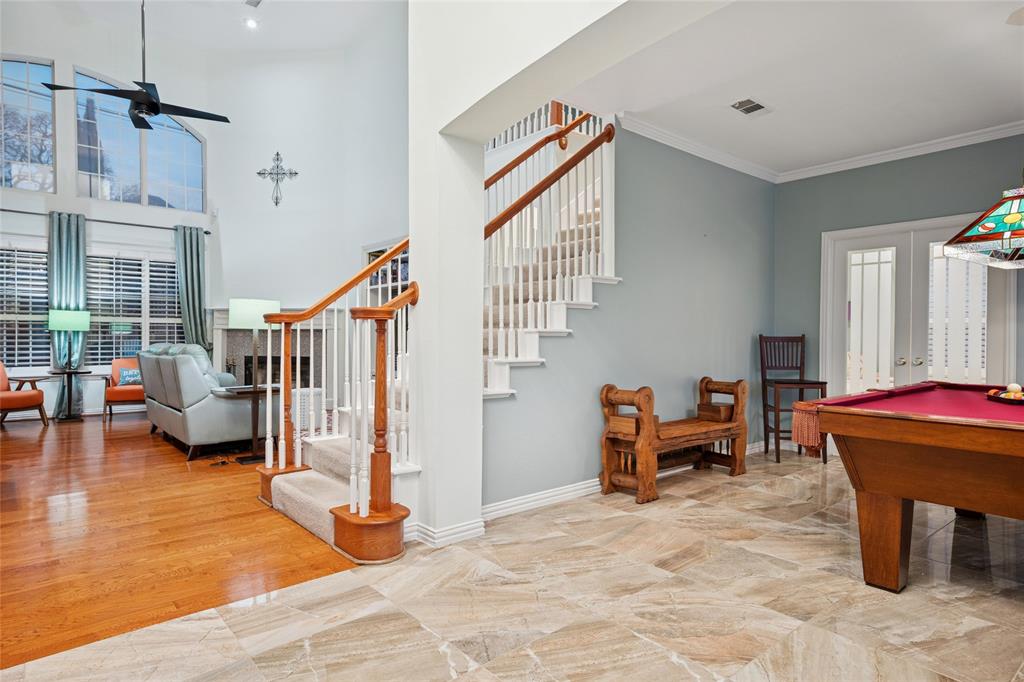 125 Bricknell Lane Coppell, TX 75019 - Photo 6 of 27 a view of a livingroom with furniture and staircase