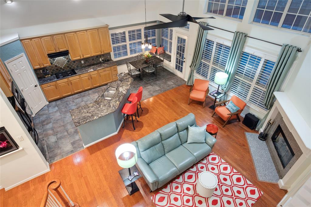 125 Bricknell Lane Coppell, TX 75019 - Photo 9 of 27 a view of living room with furniture and a fireplace