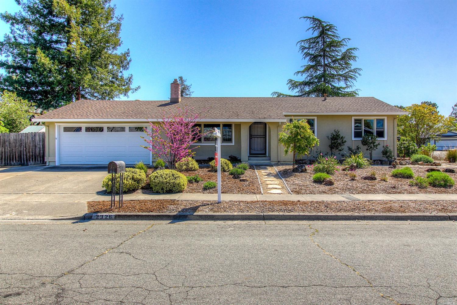 2326 Carson Street Santa Rosa, CA 95403 - Photo 1 of 1 front view of a house with a small yard