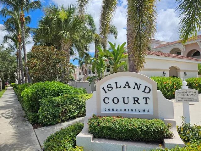 a sign on the side of a road