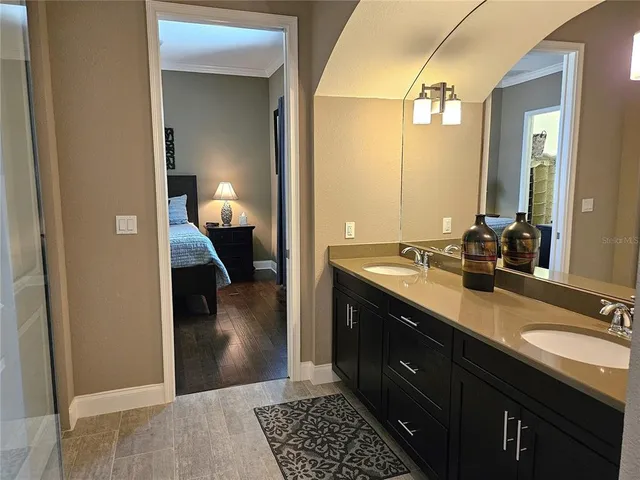 a view of storage and utility room with wooden floor