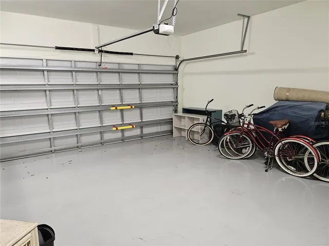 a swimming pool with outdoor seating and yard