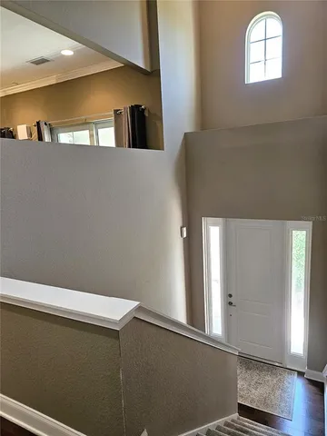 view of room with window and wooden floor